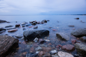 Wschód słońca na plaży w Gdyni, Morze Bałtyckie, Polska