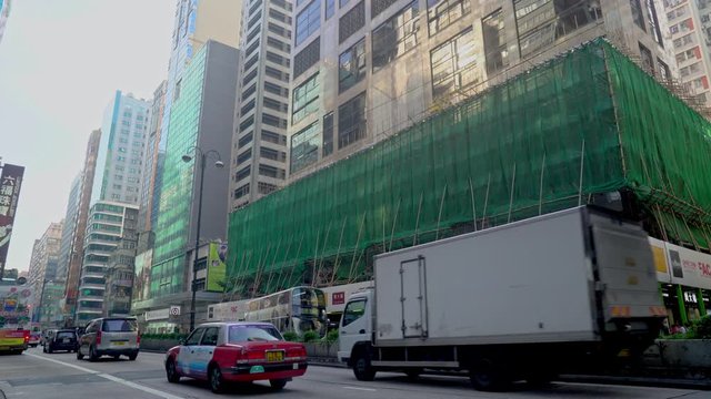 Busses and cars on Nathan road in the center of HongKong