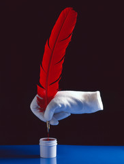 an invisible hand with a white glove holding a red feather pen with an inverted drip on a black background