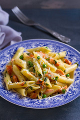 Creamy salmon penne pasta with green peas