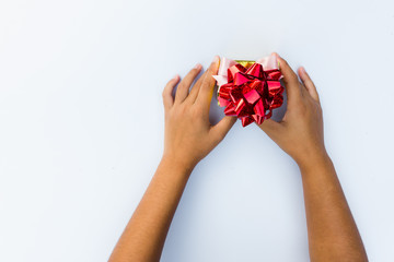 gift in hand isolated on white background