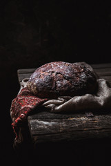 Obraz premium Bread on a rural on a black background. homemade baking