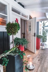 Fototapeta na wymiar Welcoming Scandinavian Wooden House at Christmas