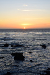 Fototapeta na wymiar Pacific sunset at Big Sur, the beautiful and rugged Californian coast along Route 1, California