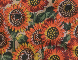 Horizontal photo of vintage sunflower cloth.