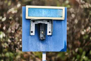 The call button on a post. Gate bell