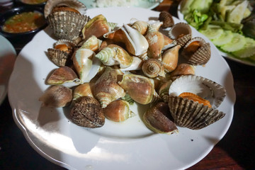 Blanched cockles on a plate in Thailand