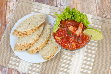shrimp seviche in tomato and lemon sauce