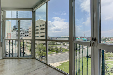 Window-wall in Denver high rise overlooking 14th and Lawrence Streets
