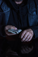 Man holding dollars
