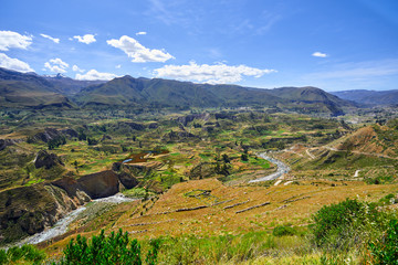 Obraz premium Terraces on the Colca River. In the background the birth of the Amazon River in the Cordillera Chila, on the slopes of the Mismi, in Arequipa, Peru