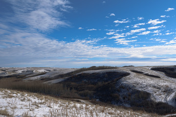 blue skies and whit hills