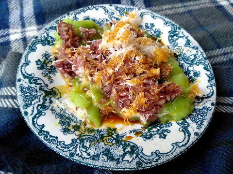 Bubur Sumsum Ijo Bali or marrow porridge. Makanan Bubur khas bali or Balinese specialty porridge. porridge added with sweet sugar and jaje injin. traditional indonesian culinary food.