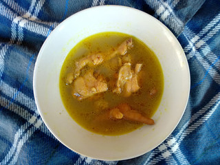 Traditional indonesian culinary food. Sup Ayam Sedap or chicken soup. Sup Ayam Indonesian Food that is simple and delicious. Indonesian Street Food.