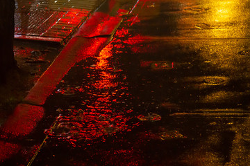 Rainy street with red light in Columbia City