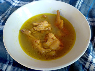Traditional indonesian culinary food. Sup Ayam Sedap or chicken soup. Sup Ayam Indonesian Food that is simple and delicious. Indonesian Street Food.