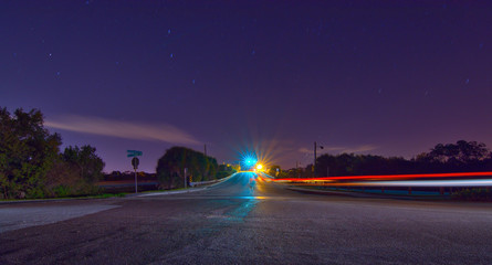 Fototapeta na wymiar Starry Sky Night Bridge Taillights