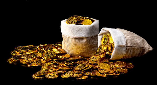 Stacking Gold Coin In Treasure Sack Lot Of At Black Background