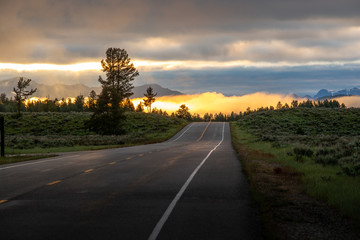 Empty Road leading into the sunrise - 305841730