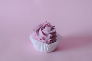 Homemade marshmallow berry zephyr on pink background