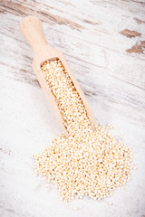 Quinoa seeds on scoop as source healthy minerals and vitamins