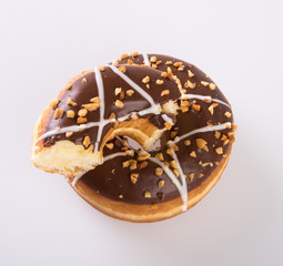 donut or donut with missing bite on a background new.