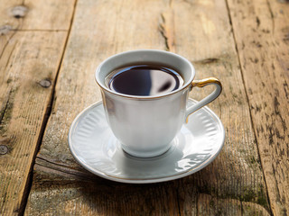 A Cup of tea on an old wooden surface