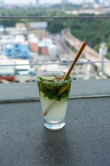 Close up View of Mix Drink With City in the Background