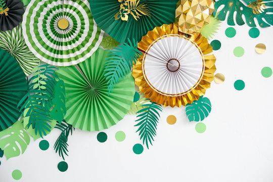 Green, Emerald, Gold And Yellow Papers Circle Shape Of Origami. Abstract Background Of Paper Designs. Copy Space.