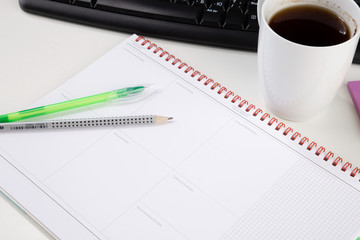 Office workplace table with supplies and coffee cup. Flat lay. Top view with space for your text