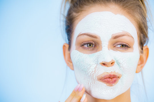 Girl With Dry White Mud Mask On Face