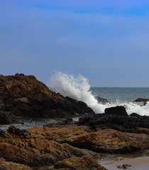 waves crashing on rocks