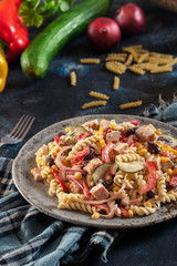 Fusilli pasta salad with smoked turkey