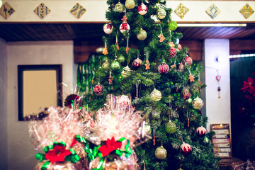 Fototapeta na wymiar Beautiful decorated Xmas tree with shiny gifts 