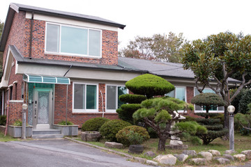 Naju-si, Jeollanam-do / South Korea - OCTOBER 17, 2019: Side of Catholic church mini plant garden 천주교 나주 성당 South Korea, Jeollanam-do, Naju-si, Sanjeong-dong, 18-2