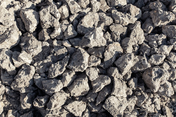 Abstract stone background of a destroyed road.