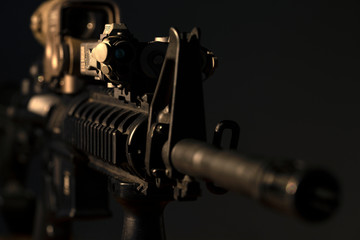m4 rifle with optical sight and laser device