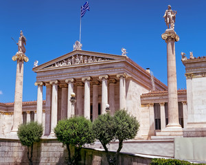 Fototapeta na wymiar Athens Greece, the national academy lassical building white marble facadewith Athena and Apollo statues