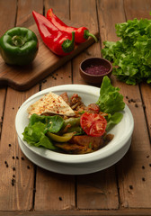 roasted lamb with bell pepper and tomato