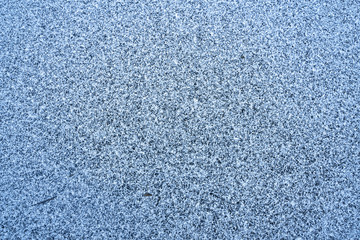 The structure of the ice cover on the lake, after severe frosts autumn, winter. Texture, background.