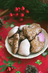Obraz na płótnie Canvas Gingerbread cookies on the table, with festive Christmas decoration