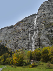 Autumn at the Mürrenbachfall waterfall in the Lauterbrunnen valley. Bernese Oberland Switzerland