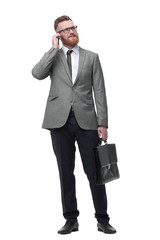 confident businessman with briefcase . isolated on white background