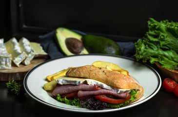 salami sandwich with chicken fillet, tomato, lettuce, served with fries