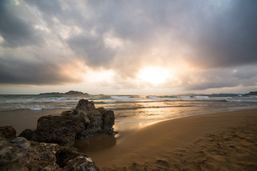golden sunset on the Greece beach