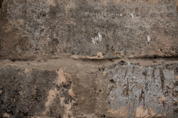 dirty gray brick. to spackle a wall. the texture of the old grey brick