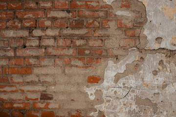 The ancient wall of the building. brick wall texture. repair the wall. to spackle a wall. template for work