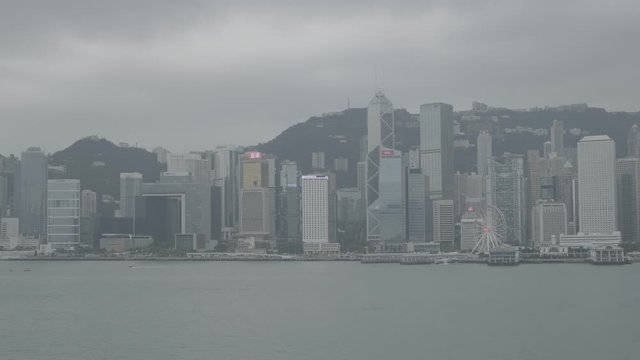 Victoria Harbor and Hong Kong Island Skyline overcast . Hong Kong has the world's largest number of skyscrapers. log, F-log.