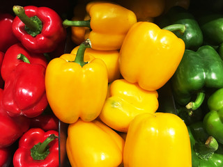 Red Yellow and Green Bell Peppers Vegetable Stall Display