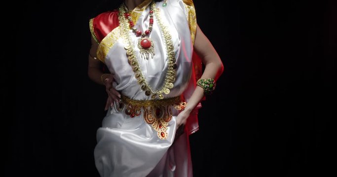 Indian deity Saraswati in white dress is looking and reaching out, 4k